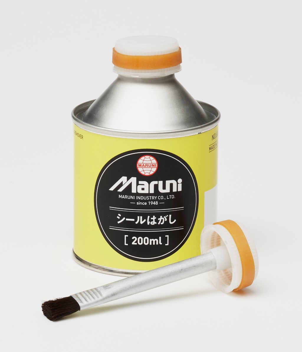 スーツ ケース シール はがす